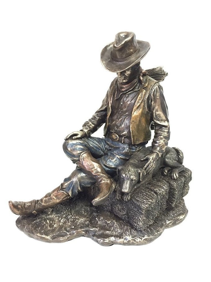 S WU COWBOY AND DOG NAPPING STATUE SCULPTURE