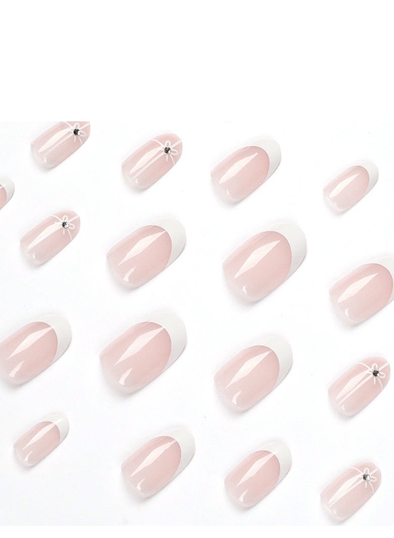 جوسكوين أظافر لاصقة، مجموعة من 24 قطعة لأظافر مصممة بأسلوب بسيط وفرنسي وزهري بتدرج وردي وأزهار، مع بعض الأحجار الصغيرة أو الزينة لأناقة سهلة ومظهر راقٍ، أظافر أكريليك مع مجموعة غراء. - Image 4