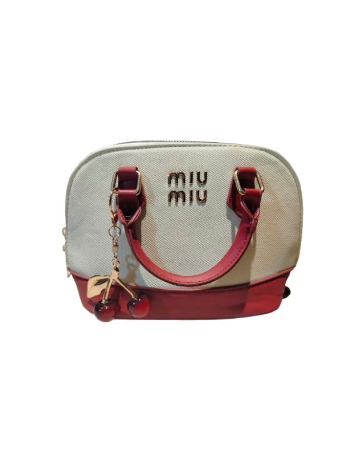 Miu Miu Luxury women's handbag in beige and burgundy - Image 1
