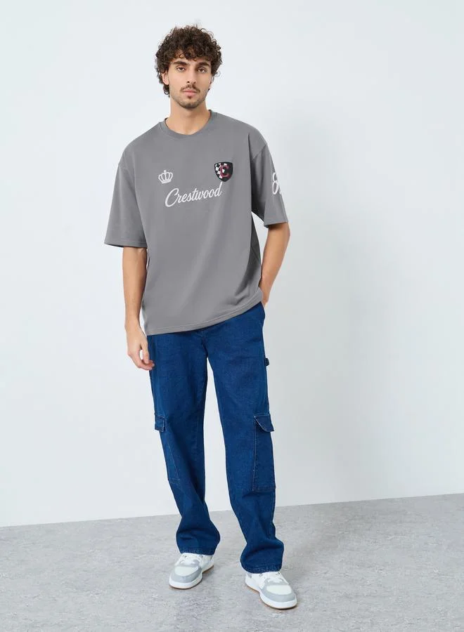 Styli Men Grey Front Chest and Sleeve Print Oversized T-Shirt