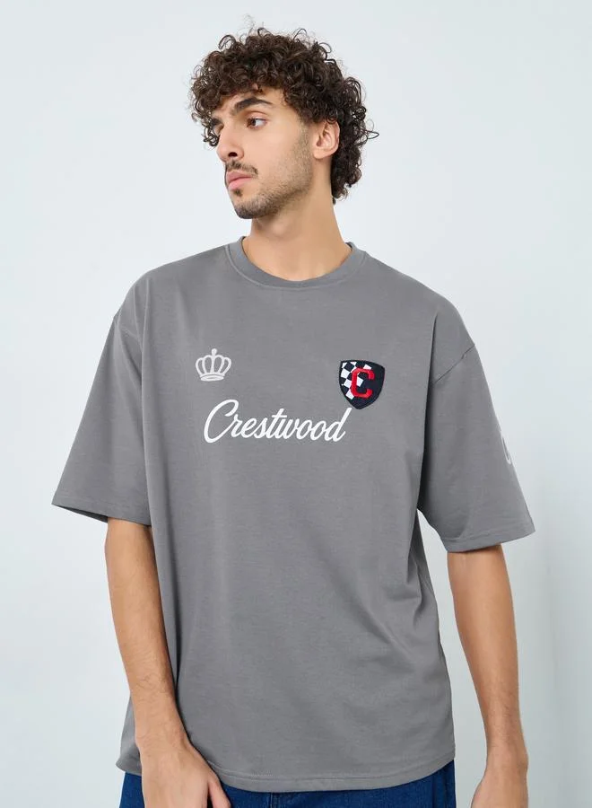 Styli Men Grey Front Chest and Sleeve Print Oversized T-Shirt