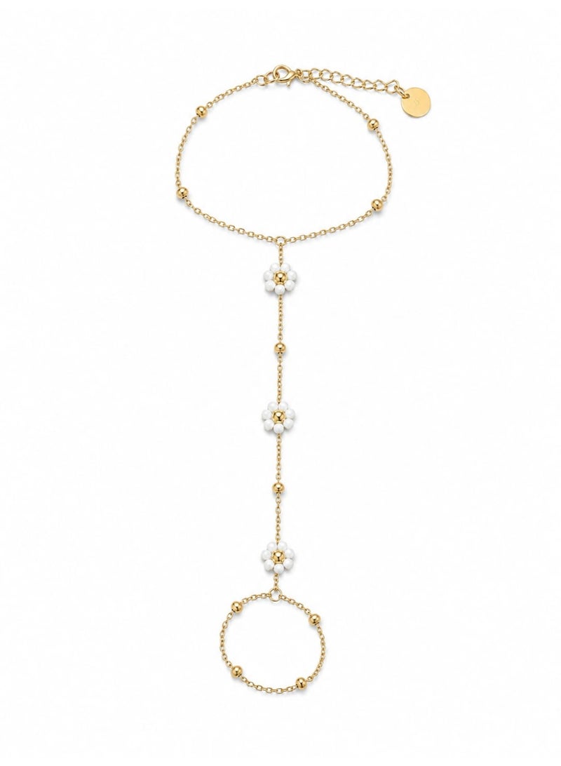 Luxuria A gold palm bracelet (ring attached to a bangle) decorated with white pearl roses. - Image 1