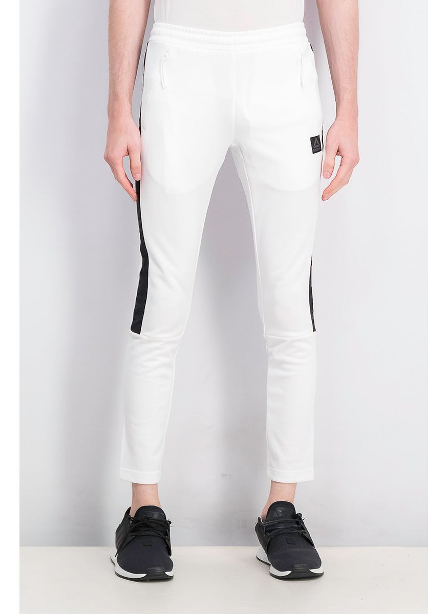 Men Sportswear Fit Side Stripe Training Track Pants, White - pzsku/Z8FB70BBEE733508A26D0Z/45/_/1724351261/fe571f14-6c46-44ee-88d4-d93e0639dd27