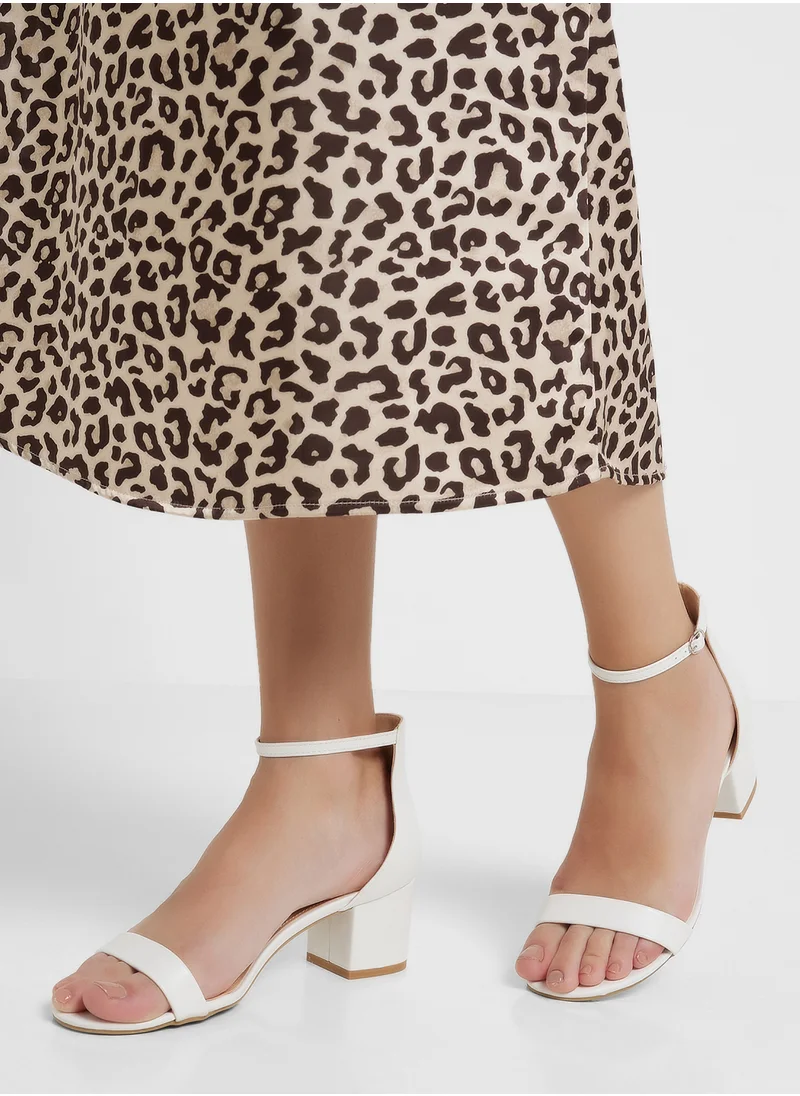 ترافل من نمشي Block Heel Clip Open Sandal