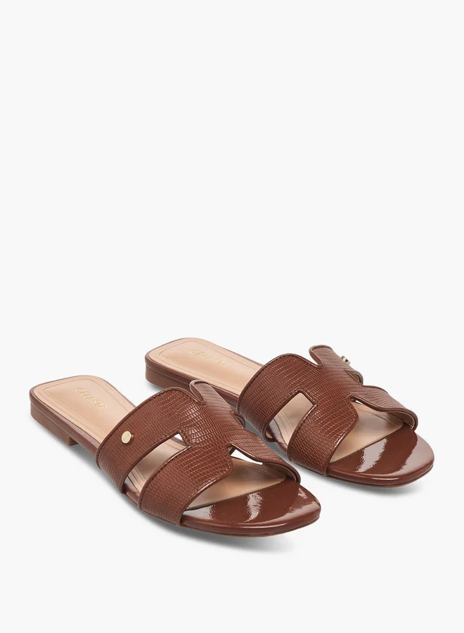 سيليست Women's Textured Slip-On Flat Sandals