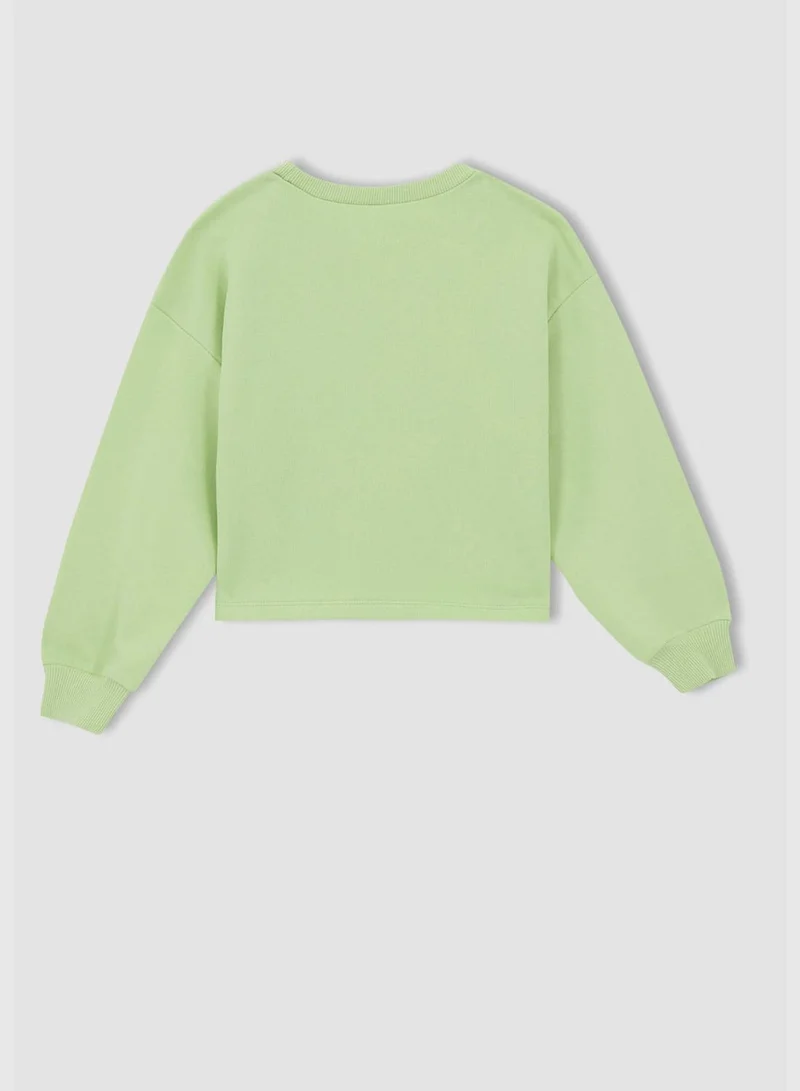 ديفاكتو Long Sleeve Heart Print Crop Sweatshirt
