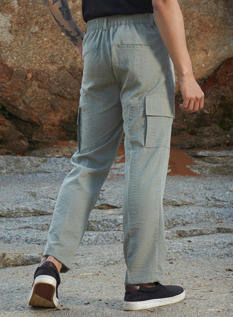 Campus Sutra Campus Sutra Men's Sage Green Crinkled Utility Trousers For Casual Wear | Regular Fit | Low-Rise | Button Closure | Cargo Pants Crafted With Comfort Fit For Everyday Wear - Image 3