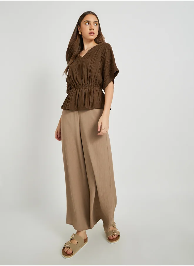 Styli Textured V-Neck Top with Elastic Waist Detail