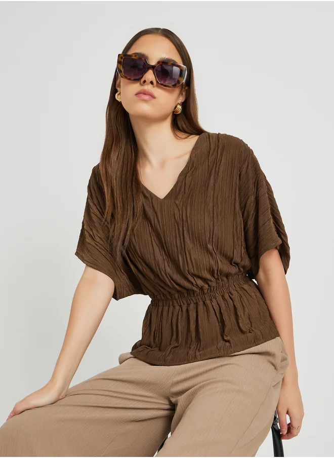 Styli Textured V-Neck Top with Elastic Waist Detail