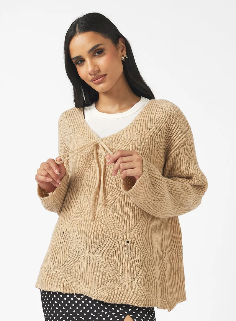 جينجر كنزة فضفاضة محبوكة مضلعة