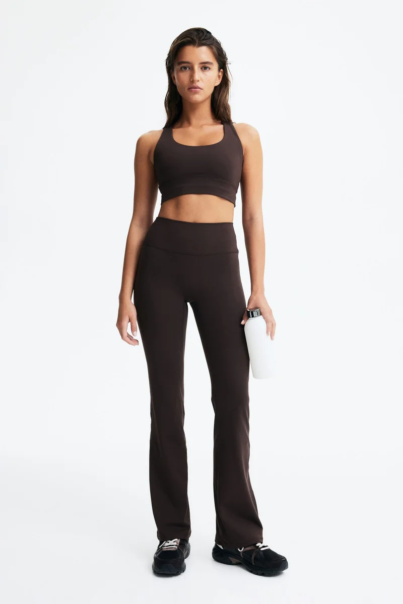H&M Flared sports leggings in SoftMove™