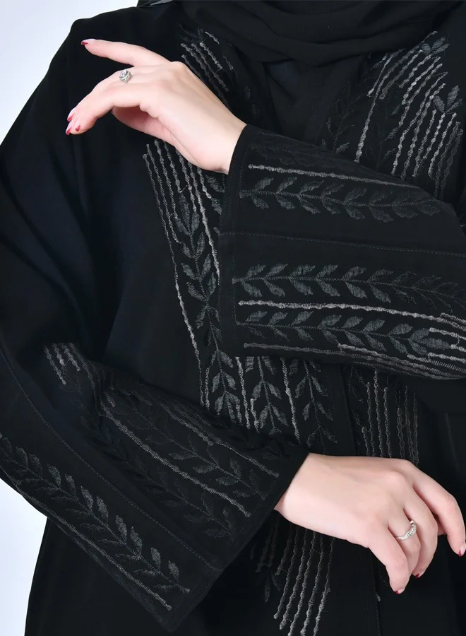 HAWRAA ABAYA Black wrap abaya with embroidery on both sides of the abaya and sleeves in black and dark grey