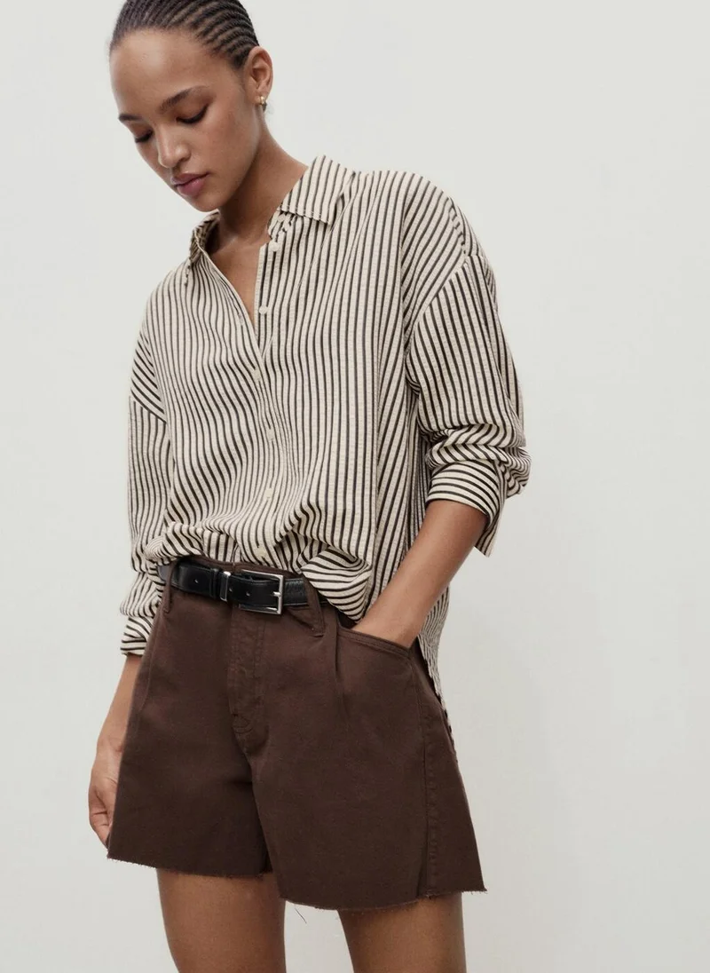 MANGO  Denim shorts with frayed hem and pleats for Women | Best Price UAE