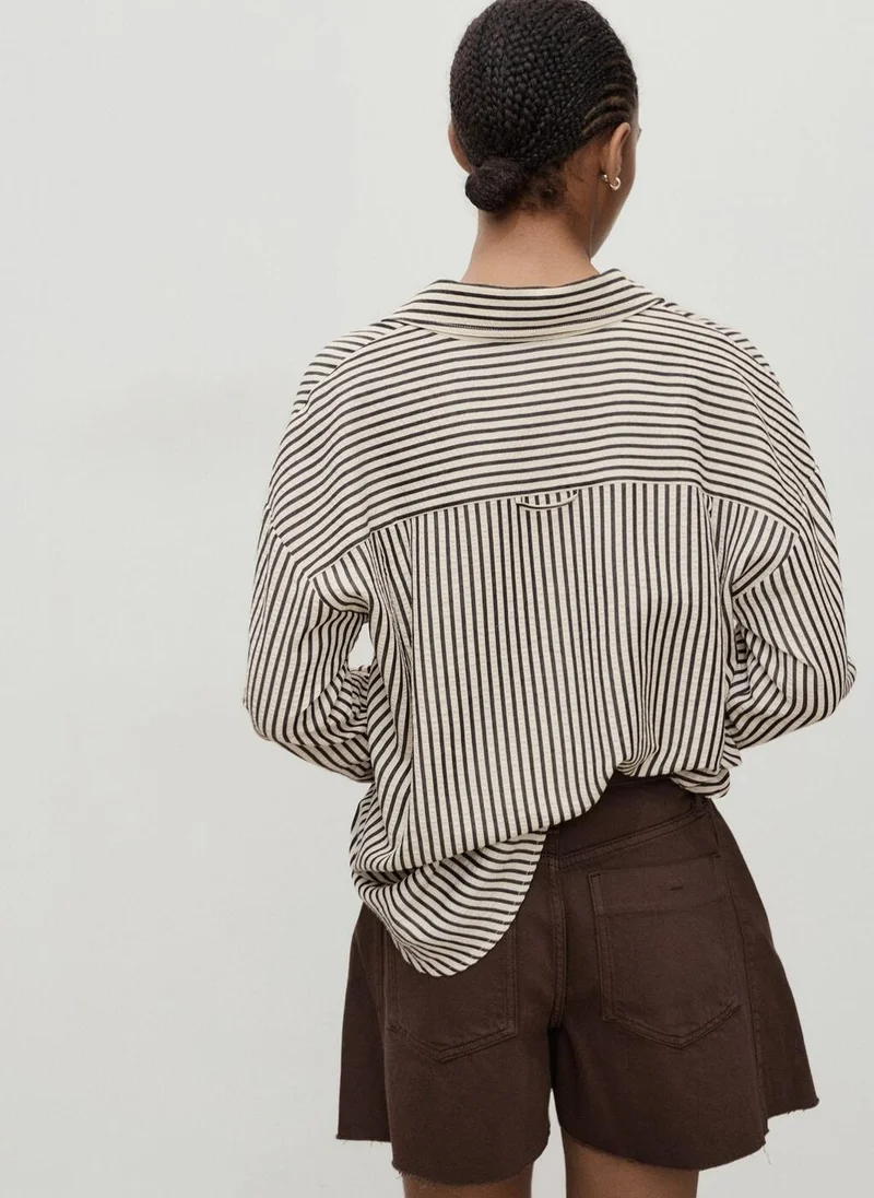 مانجو Denim shorts with frayed hem and pleats