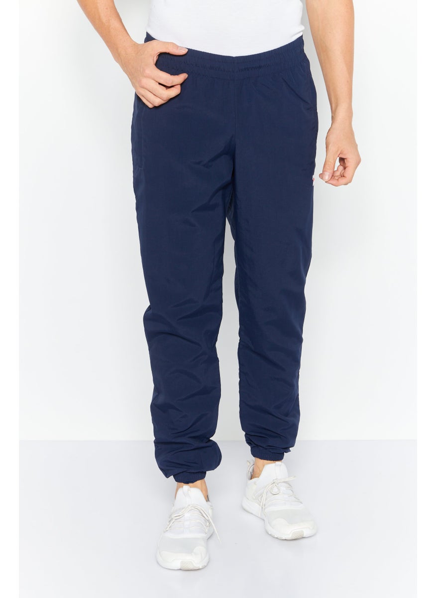 Reebok Men Sportswear Fit Brand Logo Training Sweatpants, Navy Blue  - Image 1