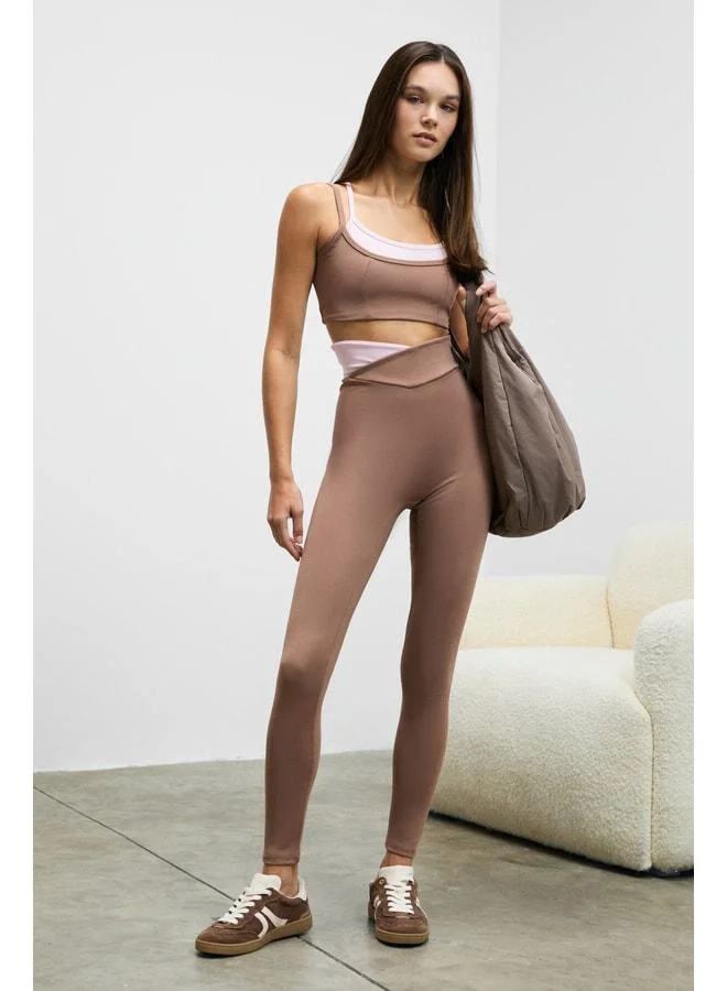 Urban Beat JULSEN Women's Soft, Stretchy Textured Brown Leggings with Asymmetric Contrast Waist Detailing.