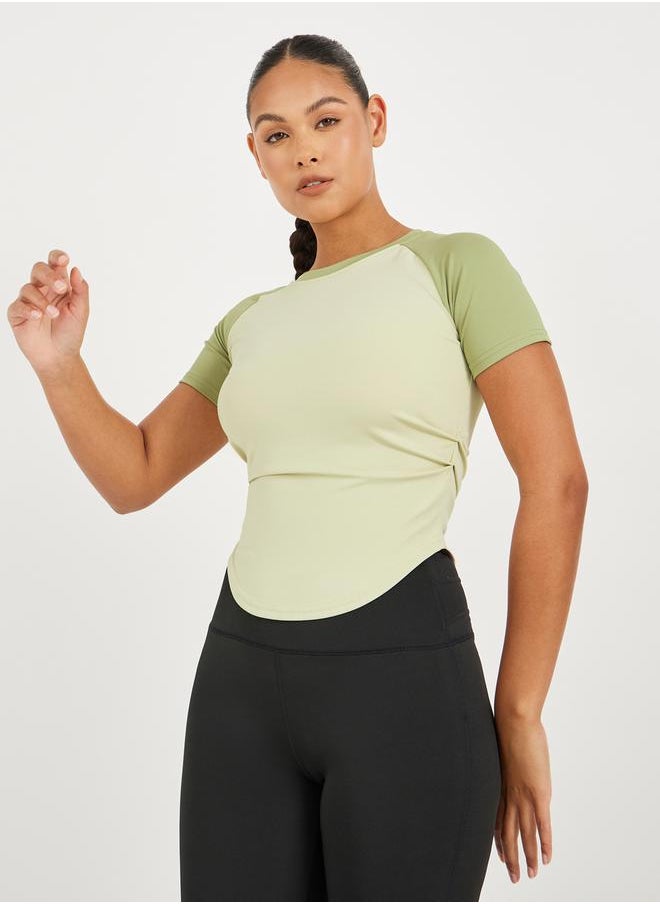 Styli Color Block Side Ruched Curved Hem Short Sleeve Top  - Image 1
