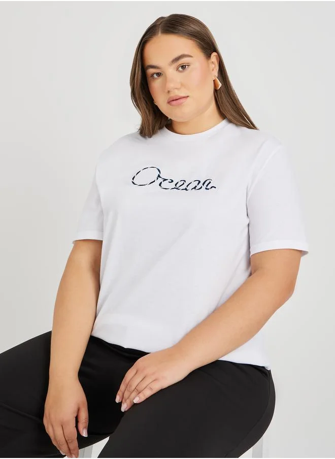 Styli Styli Plus Size Embroidered Slogan Round Neck T-Shirt
