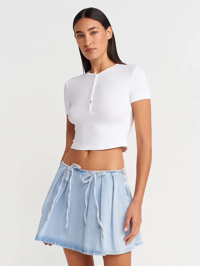ديلفين DILVIN Cotton Denim Mini A-Line Skirt With Bow Detail