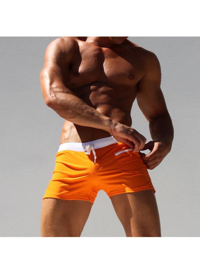 European And American New Pure Color Men's Swimming Trunks Tight Shorts Lace-up Boxers Front Pocket Swimming Trunks Quick-drying