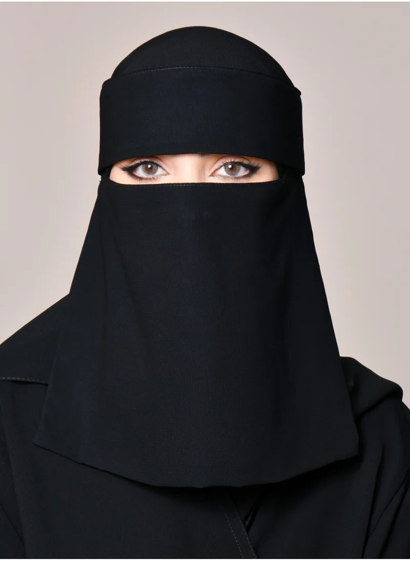 HAWRAA ABAYA A short sun niqab with elastic bands and a bow tie