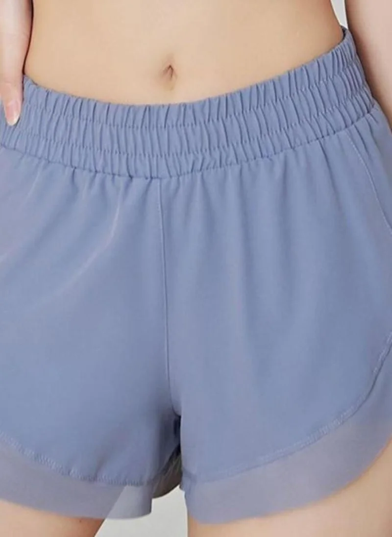 يونيكي Blue solid mid-rise yoga sports shorts