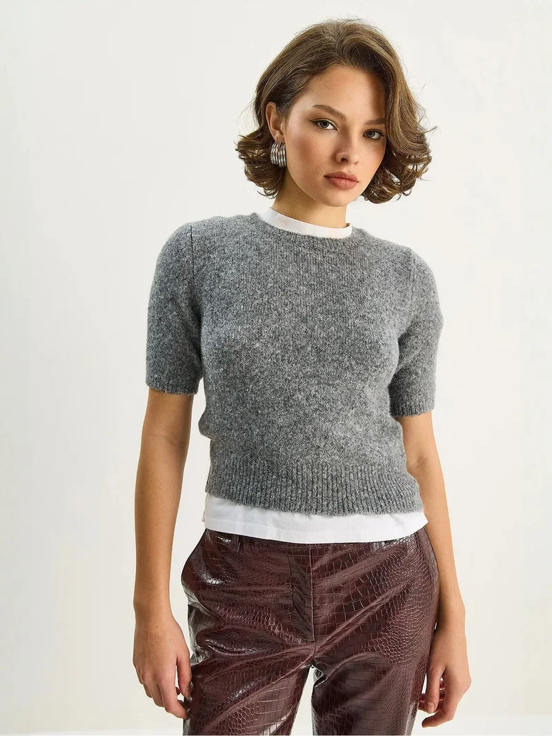 بيانكو لوتشي LUCCI Crew Neck Short Sleeve Knit Sweater