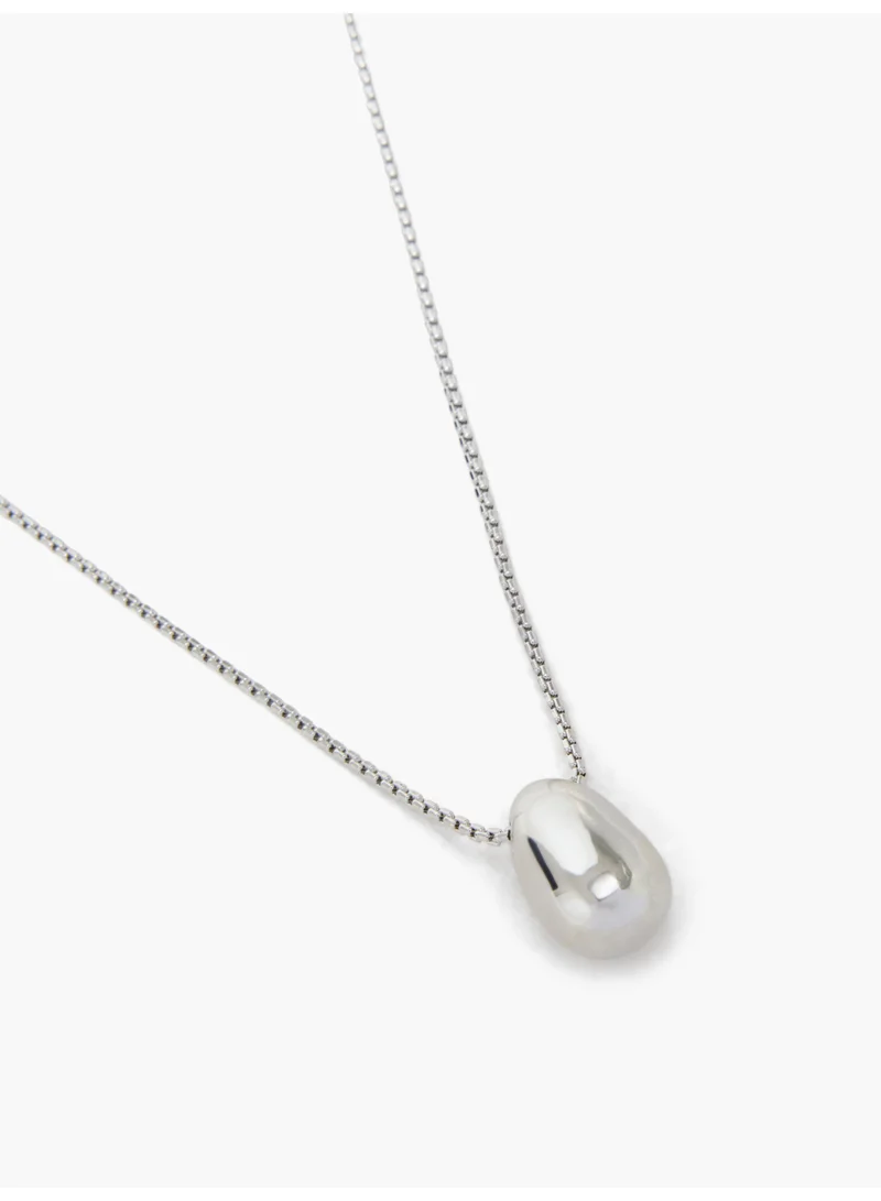 French Connection UK Sculptural Bean Pendant Necklace