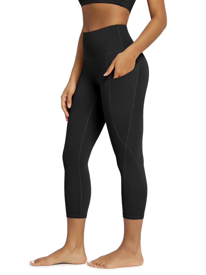 ODODOS Women's High Waisted Cropped Yoga Leggings with Pockets, 23" Inseam Tummy Control Workout Running Yoga Pants, Black, Medium - Image 1