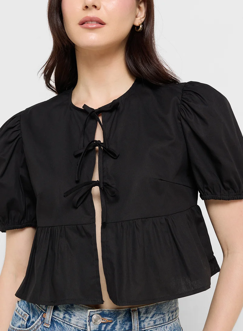 Ginger Puff Sleeve Tie Up Peplum Blouse