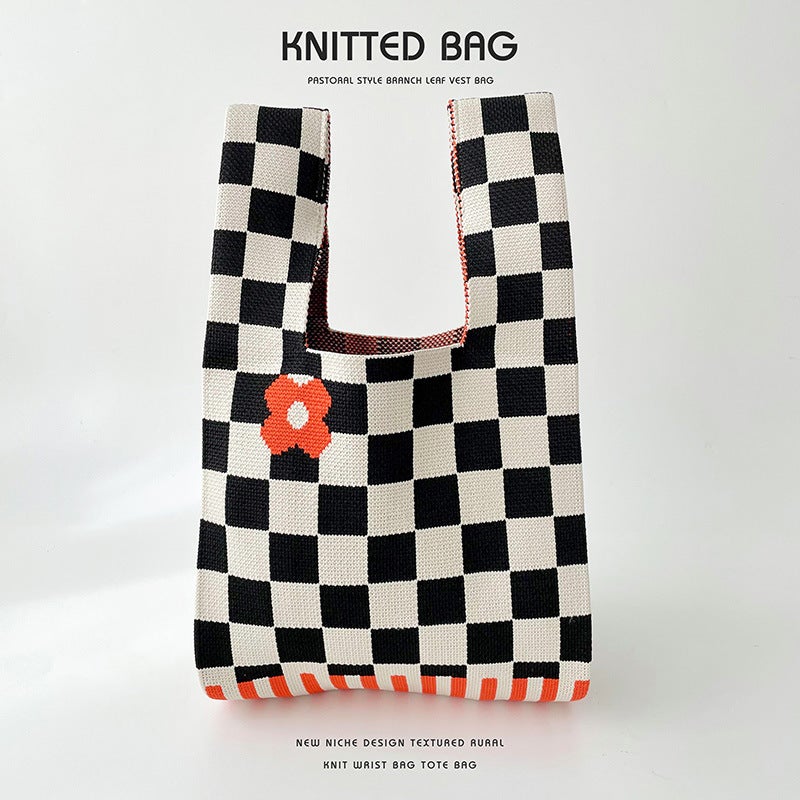 Korean Version Of The Niche Design Checkerboard Small Flower Knitted Handbag Joker Travel Large Capacity Wrist Bag Manufacturers - Image 1