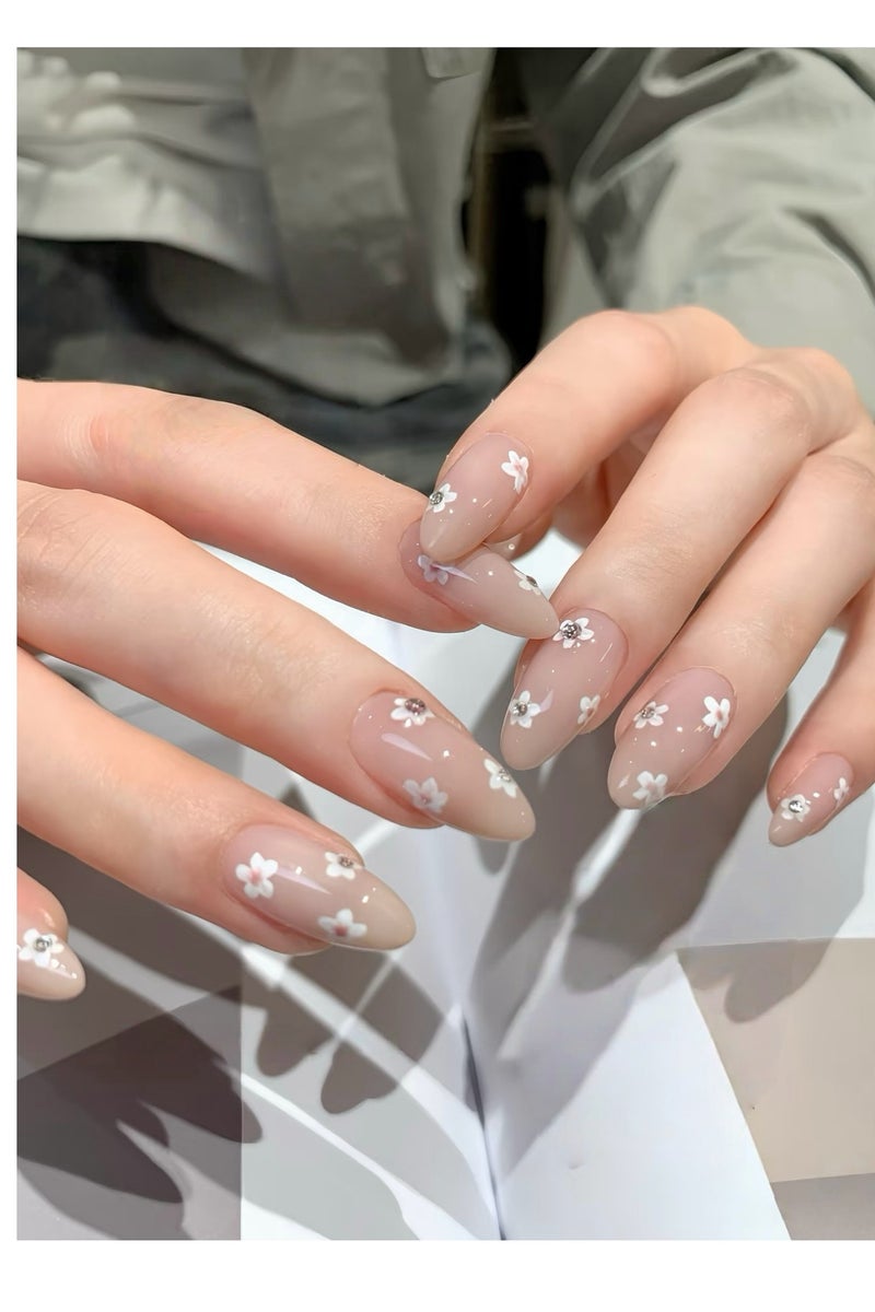 جوسكوين أظافر اصطناعية، أظافر مزيفة 10 قطع، أظافر مصنوعة يدويًا بالكامل مع مجموعة غراء، لون أبيض مزين بزهور مكسورة وألماس، بتصميم لوزي، قابلة لإعادة الاستخدام للنساء. - Image 1