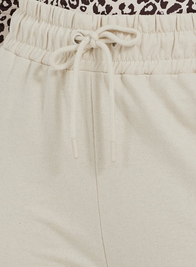 Styli Solid Drawstring Waist Flared Joggers with Side Slit  - Image 3