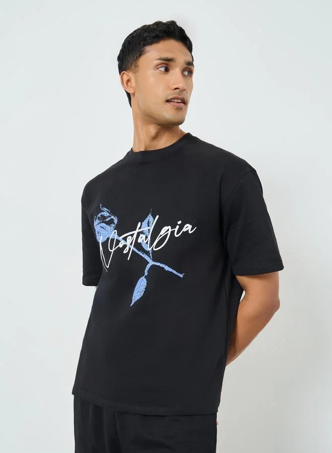 ستايلي Men Black Graphic Print Oversized T-Shirt