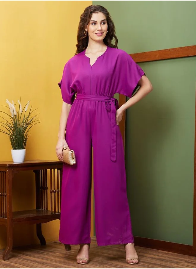 جلو باص Globus Women Purple Round Neck With V Cut & Kimono Sleeves Waist Tie-Up Longline Jumpsuit by Styli