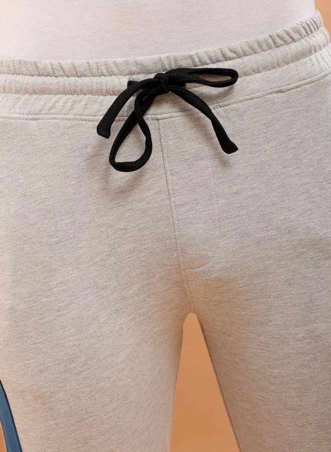 ذا انديان كراج كو Men Slim Fit Solid Mid-Rise Stretchable Knitted Jogger Trousers