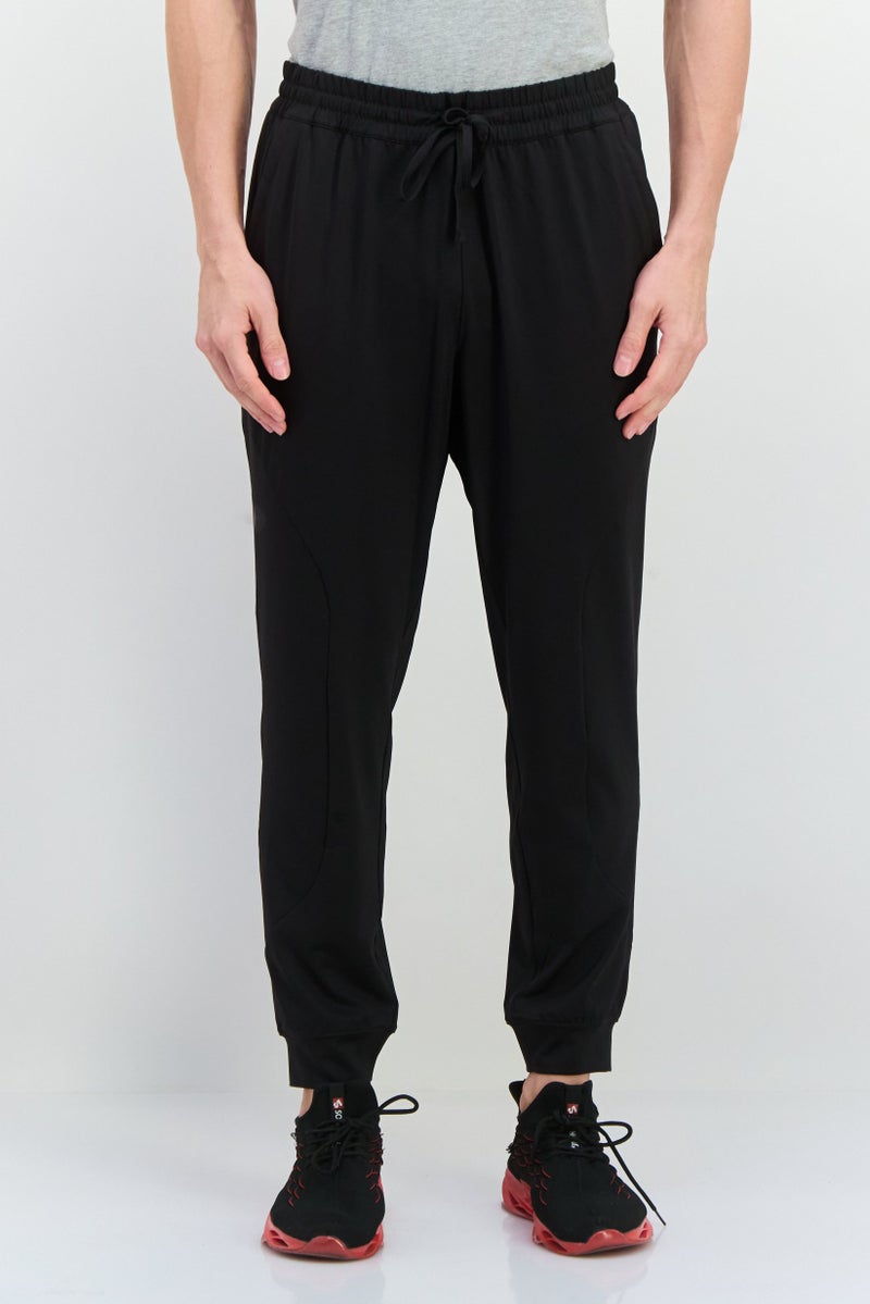 PUMA سروال رياضي للرجال مع حبل سحب، أسود - Image 1