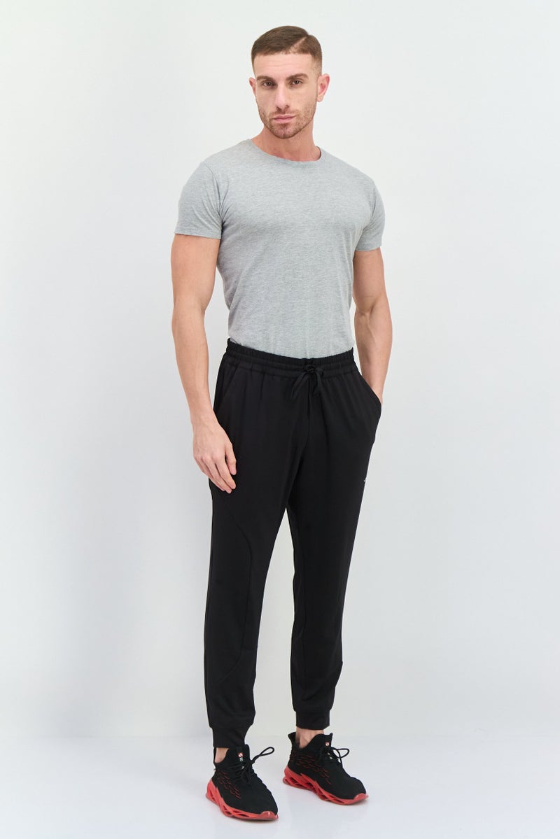 PUMA سروال رياضي للرجال مع حبل سحب، أسود - Image 2