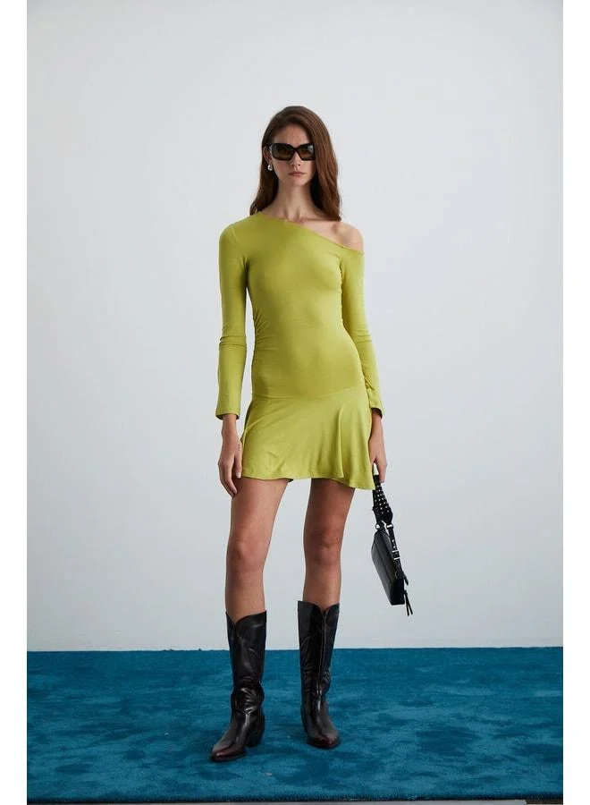 Ethiquet GLENIS Women's Viscose elastane Boat Neck Dress with a Fitted Bodice, Flared and Asymmetric Green Skirt.