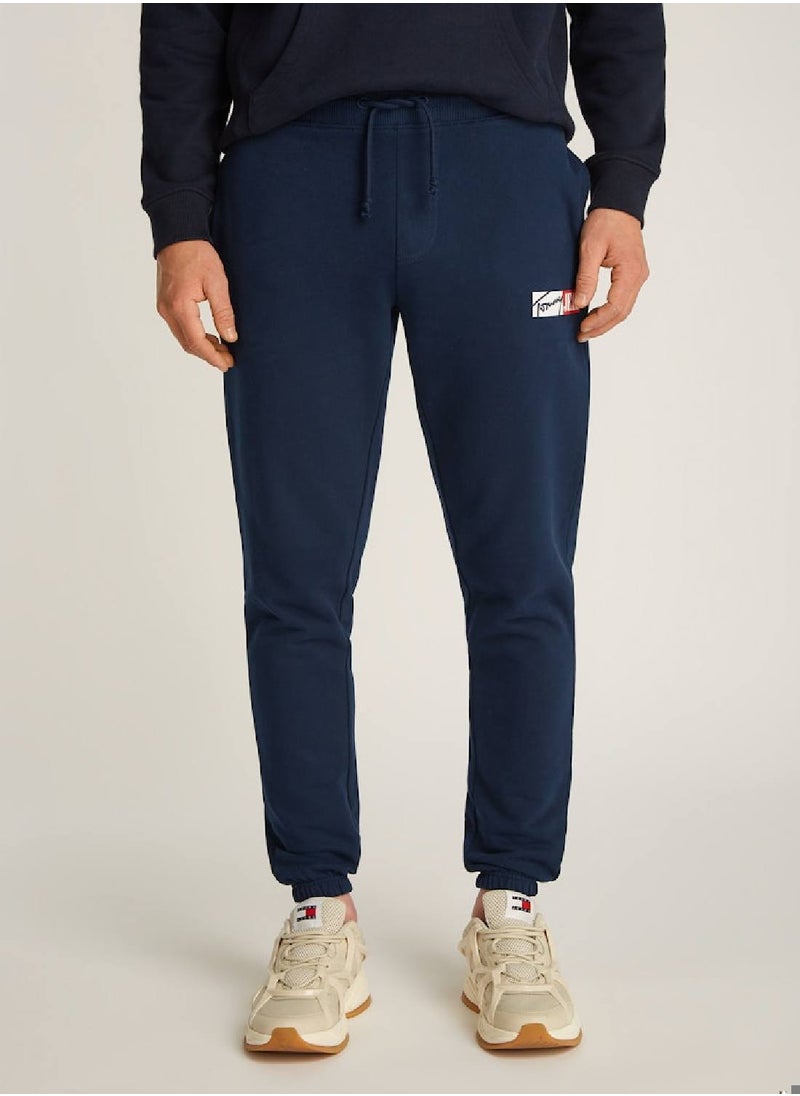 TOMMY JEANS Men's Signature Logo Cuffed Slim Joggers - Cotton, Blue  - Image 1