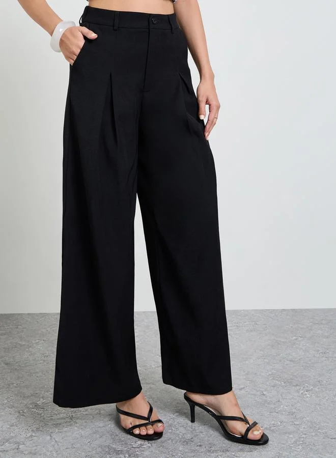 Take Two Black Solid Wide Leg Ruffled Trousers