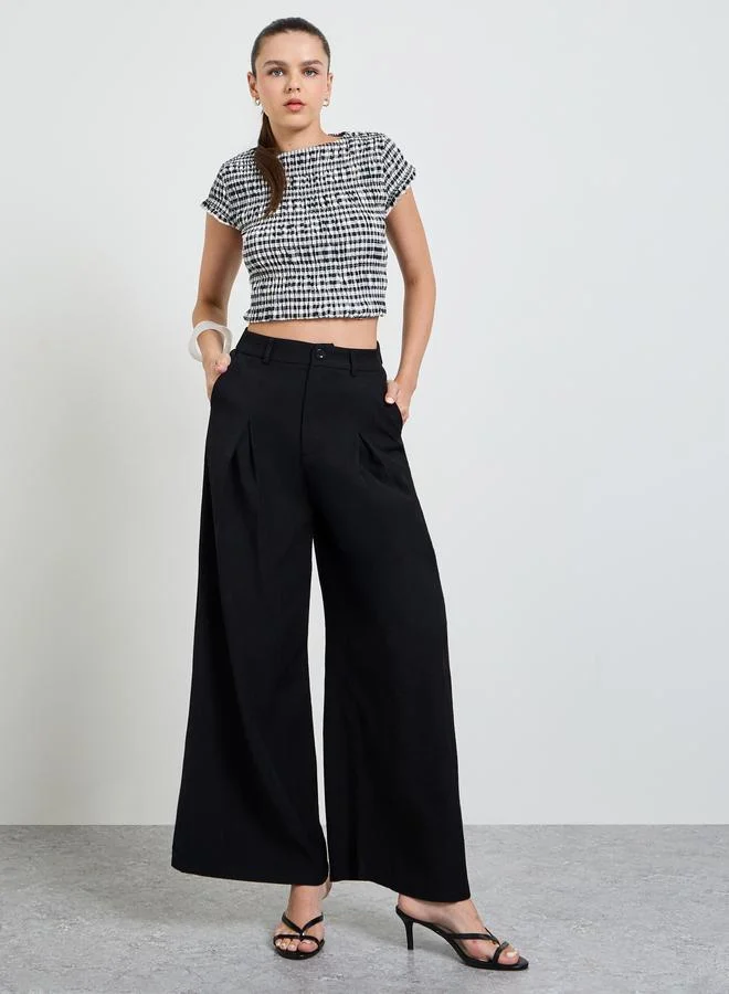 Take Two Black Solid Wide Leg Ruffled Trousers