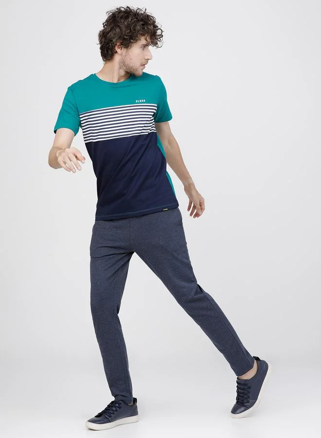 HIGHLANDER Solid Slim Fit Track Pants by Styli