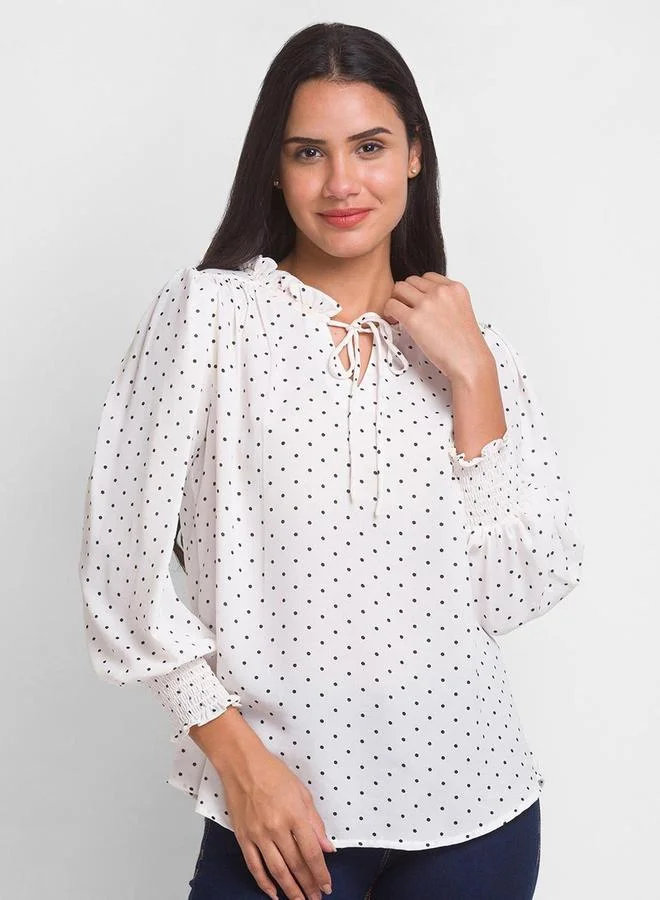 جلو باص بلوزة جلوبس بأكمام بالون وربطة عنق بنقاط البولكا