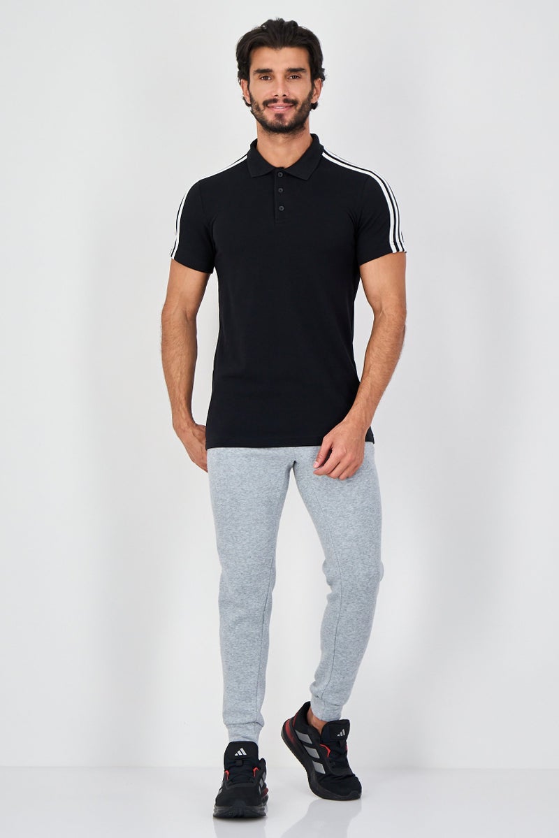 PUMA Men Sportswear Fit Short Sleeve Outdoor Polo Shirt, Black - Image 4