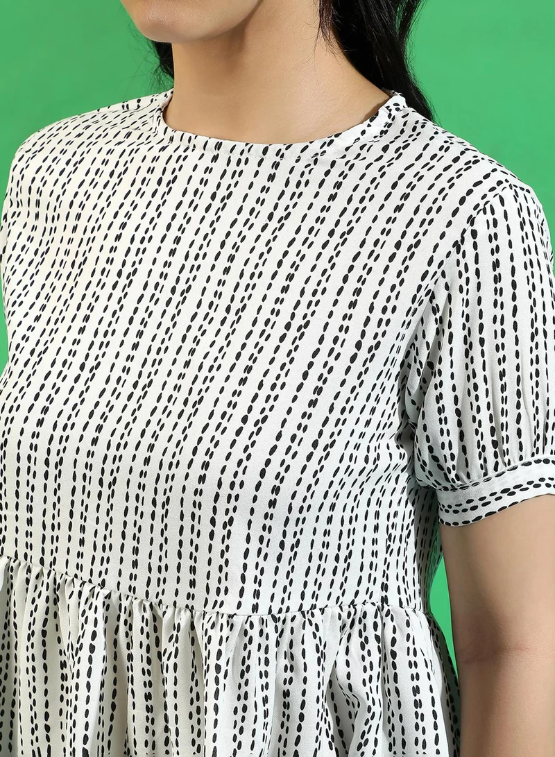 بينيا كولادا PINACOLADA Women's White Printed Peplum Top For Casual Wear | Crew Neck | Short Sleeve | Crepe Top Crafted With Regular Sleeve & Comfort Fit For Everyday Wear