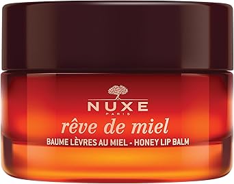 NUXE بلسم الشفاه بالعسل من NUXE Rve de Miel 15 مل بلسم مرمم للشفاه يغذي وينعم الشفاه الجافة جداً بمكونات عسل خلية النحل للاستخدام اليومي أو طوال الليل تركيبة نباتية - Image 1