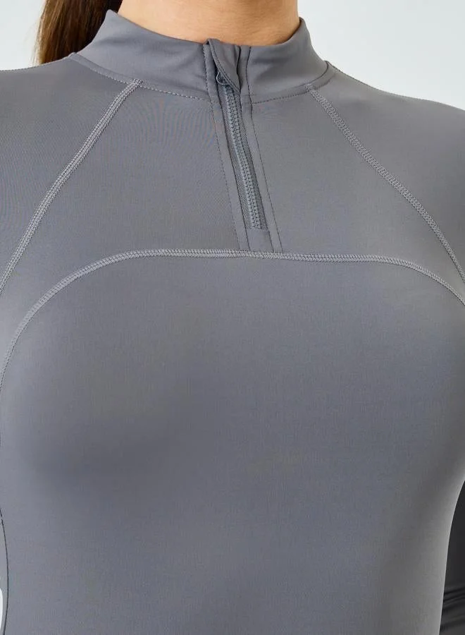Styli Active  Stitch Detail Half Zip Up Long Sleeves Top for Women | Best Price UAE