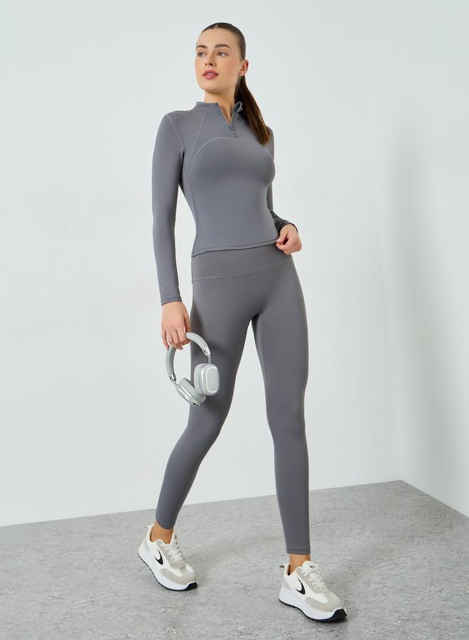 ستايلي اكتيف بلوزة بأكمام طويلة وسحاب جزئي وتفاصيل درزات - Image 2