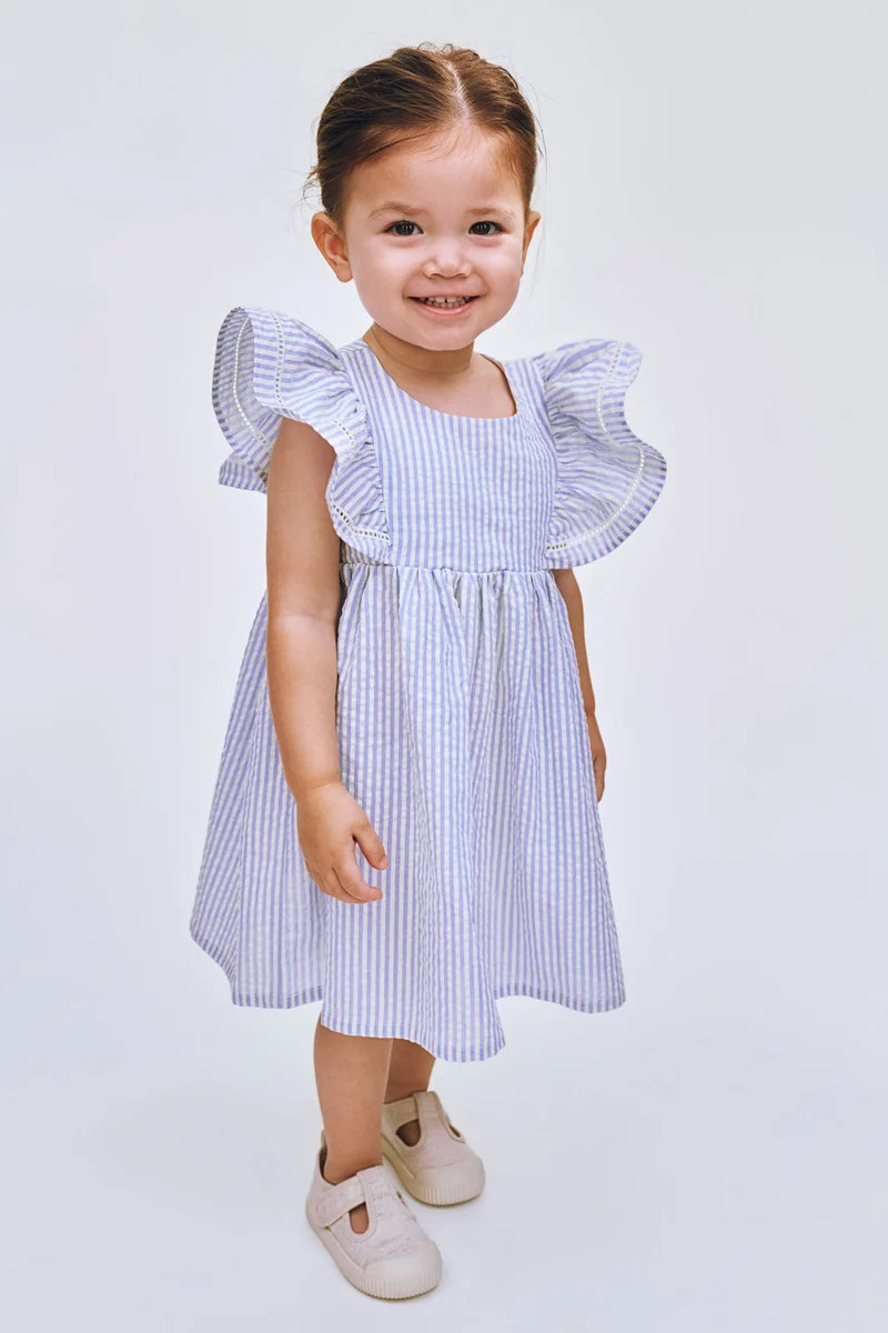 اتش اند ام فستان قطني بحواف مكشكشة